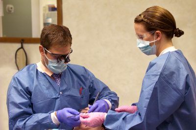 Dr Ken Randall performing dental bonding on a patient Hixson,TN
